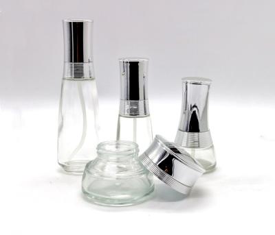 China 50ml 100ml Clear Glass Lotion Bottles Jars For Face Cream packing for sale