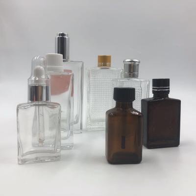 China Recycled Transparent Clear Glass Lotion Bottles Dropper 75ml 50ml for sale