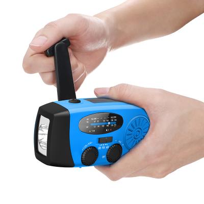 China Solar Powered Flashlight Dynamo Emergency Weather Solar Emergency Radio Flashlight Survival In The Wild for sale