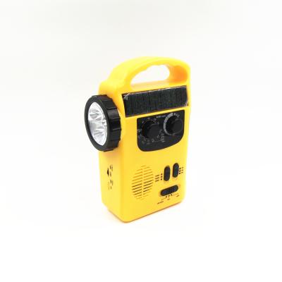 China Solar+LED Emergency Hand Crank AM fm Switch Solar Radio with LED Torch and SOS Siren for sale