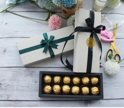 China Recyclable Paper Box Valentine Day Chocolate Boxes Wave Pattern Truffles Chocolate Custom Chocolate Show Paper Box With Inner Tray for sale