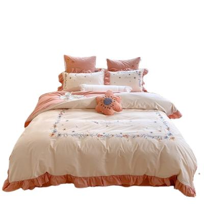 China Nondisposable process orange and white flower embroidery style cotton bed sheet set bedding for sale