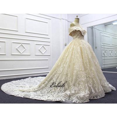 China Stunning Anti-Wrinkle Off The Shoulder Wedding Dresses Special Design Lace Champagne Long Tail Exquisite Ball Gown Wedding Dress for sale