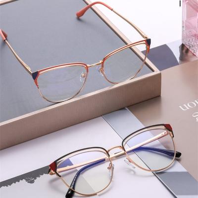 China 2022 100% 400 Protection 2022 UV Blue Trending Anti Cat Eye Frame Designer Brand Glasses Vintage Hollow Ladies Glasses For All Face for sale