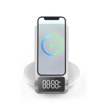 China Universal Table Top Alarm Clock Led Night Light 4 in 1 Phone Holder Radio Dock Desktop Fast Wireless Charger for sale