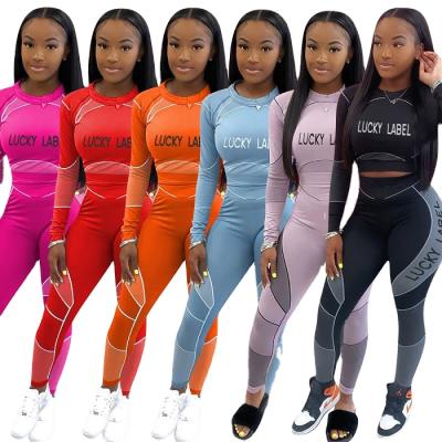 China LXSY-10 Anti-wrinkle fashionable crop top with stacked pants set 2 piece set fall clothing women's lucky label for sale