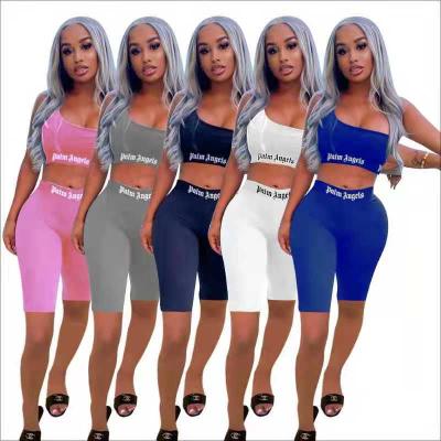 China Anti-Static Custom Logo Women Crop Top Sleeveless One Shoulder Two Piece Pants Sets Yoga Sports Wear Biker Shorts for sale