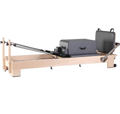 China Best Selling Wooden Pilates Equipment Gym Yoga Pilates Studio Reformer Multi Home Gym Equipment 234*68.5*32cm for sale