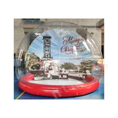 China Outdoor Inflatable Party Christmas Snow Globes With Tunnel Waist Human Snow Globe Photo Booth For Holiday Festival for sale