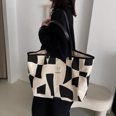 China The other new 2022 fashion version tote bag canvas bag texture Korean large-capacity shopping single shoulder bag for sale