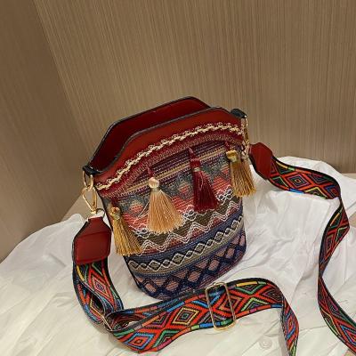 China Crossed - Bag Women's Ethnic Simple Tassel Woven Bucket Bag Women's Retro Body Style Bag 2022 Personality Shoulder Messenger Bag for sale