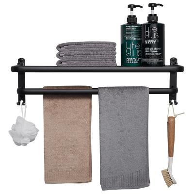 China Heater Bathroom Punch Freestanding Aluminum Towel Rack Black Multi Function Bathroom Shelf With Towel Rack With Hook for sale