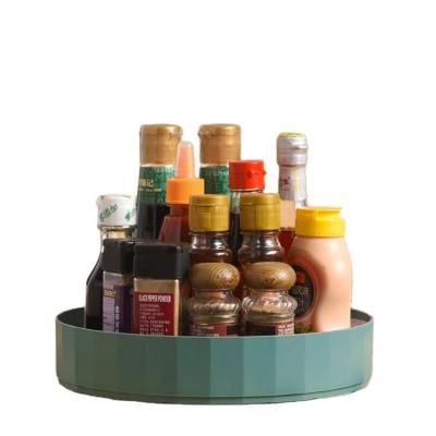 China Multifunctional Revolving Plastic Kitchen Storage Shelf Living Room Desktop Cosmetic Spice Storage Rack Viable for sale