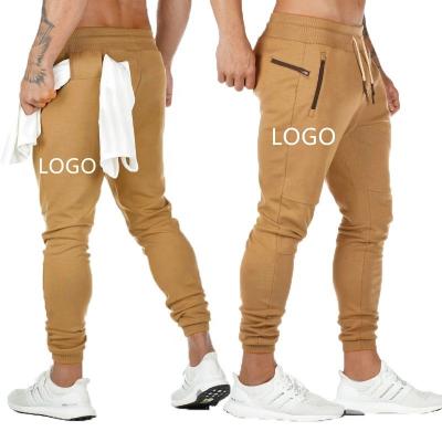 China Low MOQ Logo Men Pants Wholesale Fitness Anti-Wrinkle Jogging Pants Mens Jogging Elastic Sweatpants Sports Custom Pants for sale