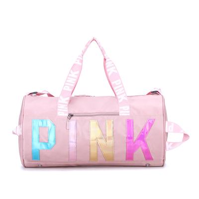 China Hot Selling Duffle Bag 2020 Sports Pink Weekend Rolling Duffel Bag For Women Outdoor Fashion Pink Travel Bag Gym Overnight Tote Bag for sale