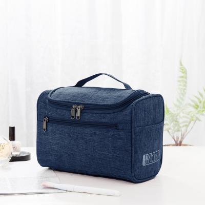 China Customized Durable And Lightweight Men Travel Wash Bag Bushes Lightweight Storage Cosmetic Pouch For Ladies Hanging Toiletry Bag for sale