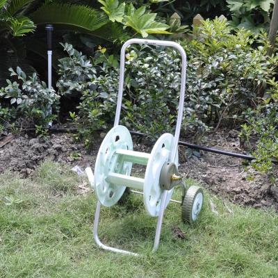 China Adjustable Push Outside Garden Irrigation 50m PVC Hose Metal Trolley Cart Watering Reel With Wheels for sale