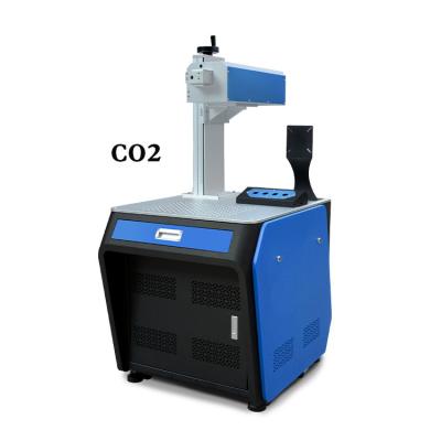 China Laser Marking New Type Attractive Price Portable CO2 Fiber Laser Marking Machine UV Cabinet for sale