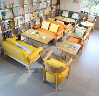 China Eco-friendly Customized library book bar rest area leisure bargain cafe sofa chair dining milk tea shop table and chair combination for sale