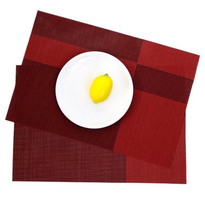 China Factory Price Sustainable Weave Rectangular PVC Table Mat Non Slip Heat Hotel Place Mats for sale