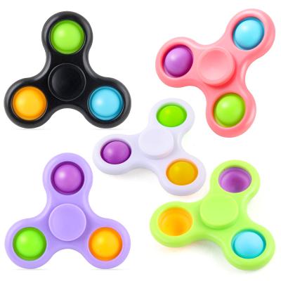 China Simple Spinner Relaxing Silicone Push Bubble Spinning Sensory Toys for sale