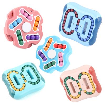 China Creative Educational Cube Spinning Effort Release Shaky Person Toys Spinning Bean Toys Fidget Magic Spinner for sale