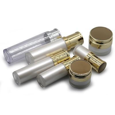 China Non-air cosmetics high-end acrylic hot bath gold-plated double-layer pump set cosmetic and skin care product packaging for sale