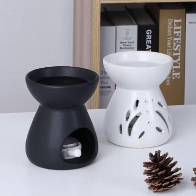 China New Black White Ceramic Candle Holder Home Fragrance Essential Oil Burner for sale