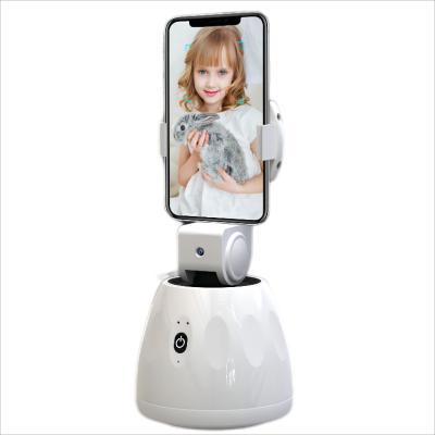 China Mobile Phone Holder Stand AI 360 Rotation Adjustable Automatic Smart Face Tracking Object Tracking Holder for sale