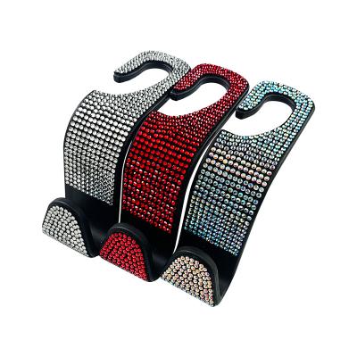 China Single Color Without Diamond Bling Rhinestones Back Universal Auto Car Storage Rack Mount Headrest Hanger Hook Seat Car Model Hooks Interior Accessories for sale