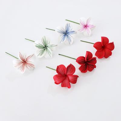 China Hawaiian Frangipani KOMI Plumeria Foam Flowers EVA Simulation Frangipani Tribal Foam Hawaiian Flowers Stem Hair Accessories for sale