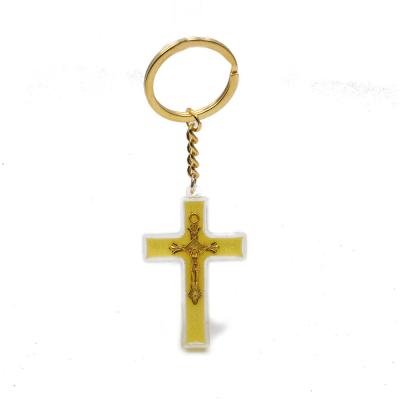 China Decoration Wholesales Crucifix Luminous Plastic Cross Pendant Jewelry Gift Keychain Religious Saints Key Chains for sale