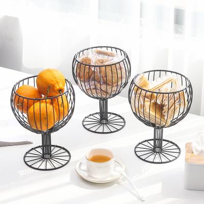 China Viable Wholesale Nordic Geometric Ins Wrought Iron Wine Hollow Cup Shaped Living Room Storage Snacks Home Fruit Basket for sale