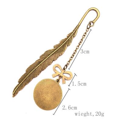 China Wholesale Europe Enamel Bookmark With Silver Pendant Custom Creative 3D Feather Gold Pendent Souvenir Bookmark for sale