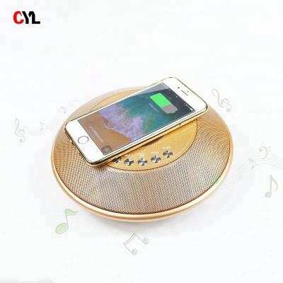 China Mini Metal Handle Mobile Phone Multifunction Wireless Clock Speaker Wireless Charger For Phone for sale