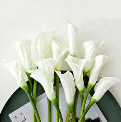 China O-1019 Wholesale Prices Eco-friendly Customized Height 63cm PU Touch Artificial Calla Lilies Real Flowers On Sale for sale