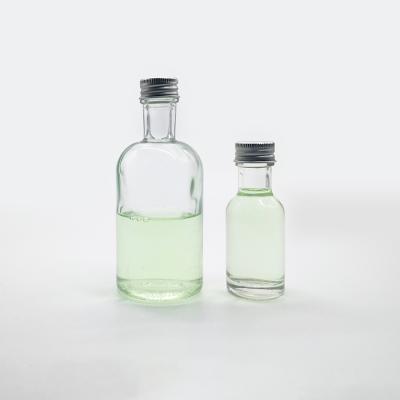 China Clear Long Neck Beverage 120ml (4 oz) Glass Spirit Bottle With Silver Aluminum Cap for sale