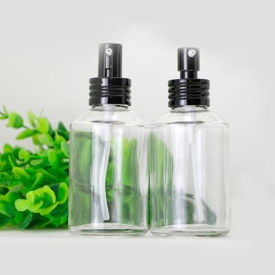 China 4 Oz Oblique Shoulder Personal Care Frosted Clear Glass Jars For Cosmetic Packaging Glass Bottle for sale