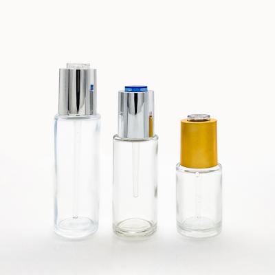 China 30ml50ml60ml Personal Care Serum Glass Bottle Empty Press Pump Dropper With Gold Aluminum Plastic Cap for sale