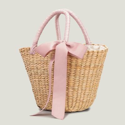 China 2022 High Quality Fashion Straw Basket Bow Embellished Knot For Beach Summer Women Handmade Bali Handbag Bags Female Bohemian Bag And Purses for sale