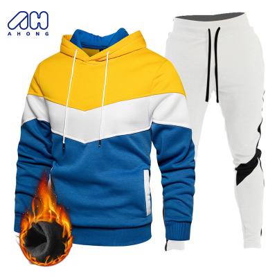 China Anti-wrinkle winter hot sale sports fitness striped plush warm skin friendly hood sweatpants and hoodie set men's tracksuits for sale