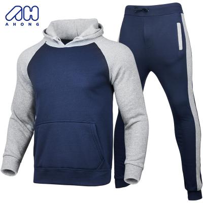 China High quality Anti-wrinkle men's streetwear 100% polyester contrast pullover hoodie and sweatpants 2 pieces jogging suits gym fitness sets for sale