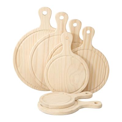 China Sustainable Wholesales Customized Wood Round Tray Serving Pizza Peel Cutting Board With Handle for sale