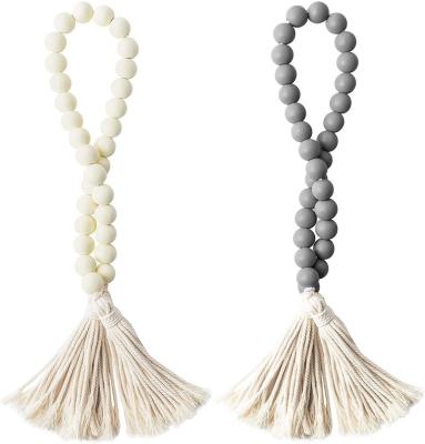 China Classic Storage Wood Beads Tassel Farmhouse Garland With Jute Rope Plaid Tassel For Home Decor for sale