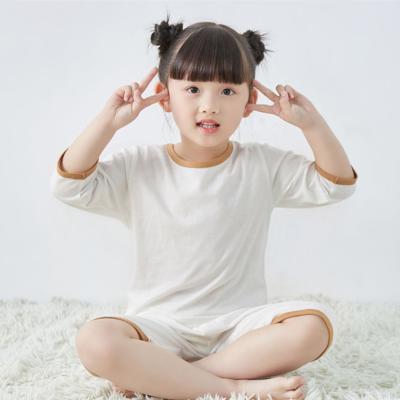 China Breathable Child Contrast Color Sleepwear Set With Shirt And Pants Pajamas Unisex Ivory for sale