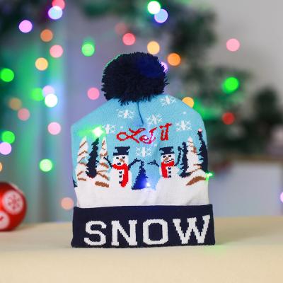 China Chirstmas Decor 2021 Hot Sale High Quality Knitted Beanie Pom Pom Light Up Led Christmas Light Hat for sale