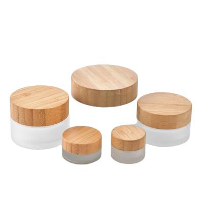 China Environmental Cylindrical Glass Container 5/10/20/30/50/100ml Empty Cosmetic Cream Cosmetic Wish Frosted Glass Jars With Bamboo Lid for sale