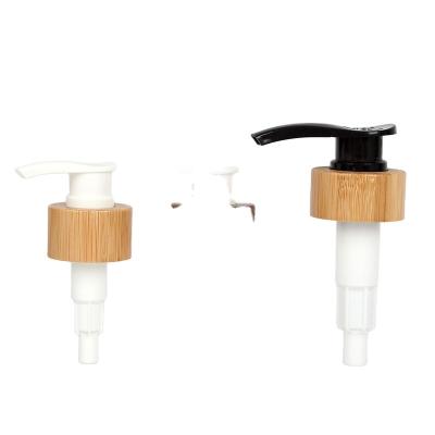 China 28/410 White Black Bamboo Head Left Right Hand Lock Cosmetic Wooden Lotion Pump for sale