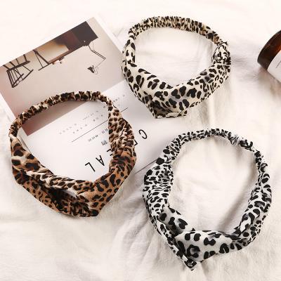 China Fashion Leopard Print Holiday Custom Hair Headband Animal Print Twisted Stretchy Hair Bands for sale