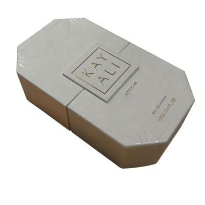 China Recycled Materials China Factory Handmade Cardboard Octagonal Perfume Box With Embossing Exterior And Gold Logo for sale